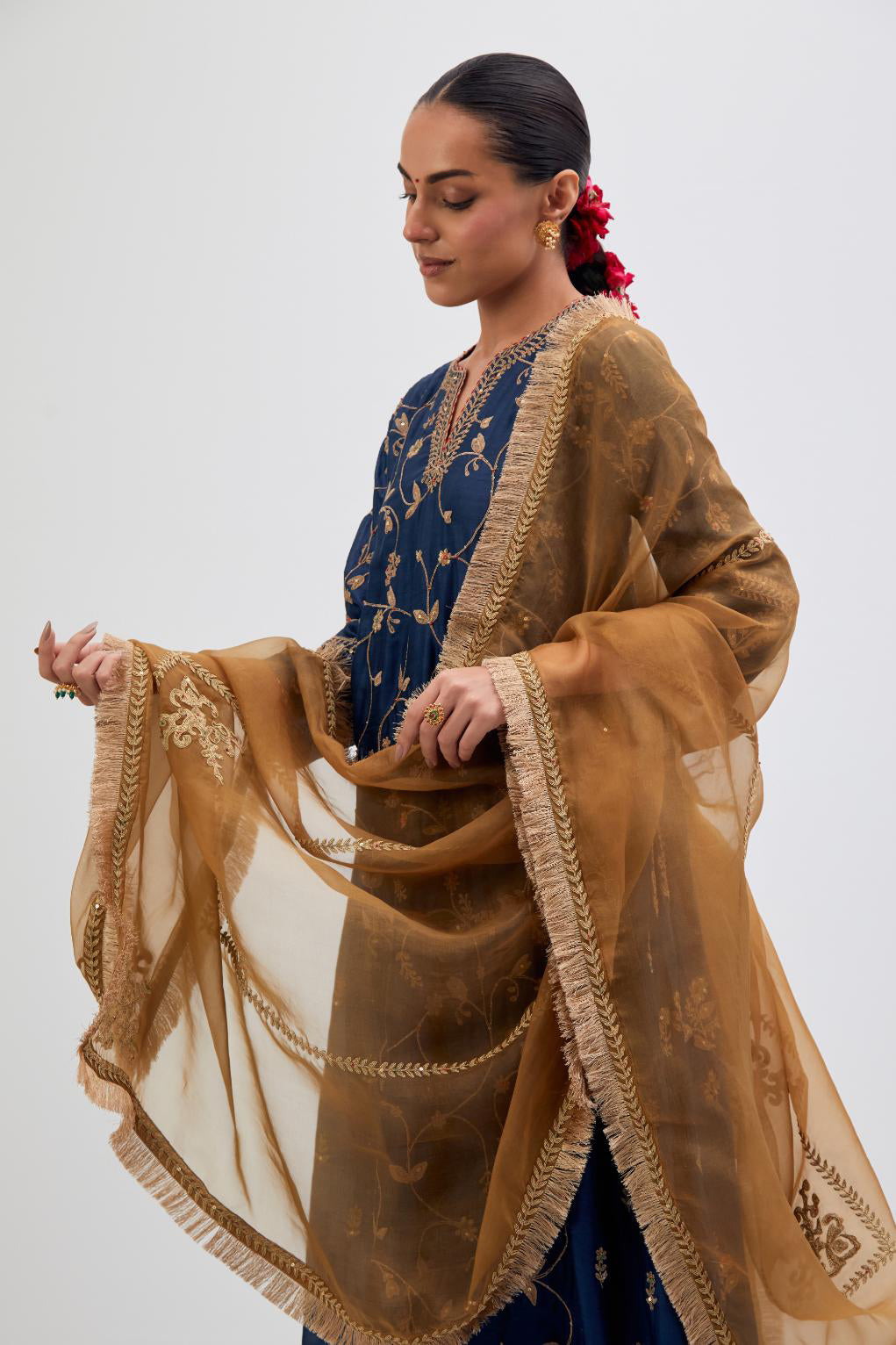 Olive Silk Organza dupatta detailed with all-over dull gold dori embroidery, highlighted with multi colored beads and gold sequins work.