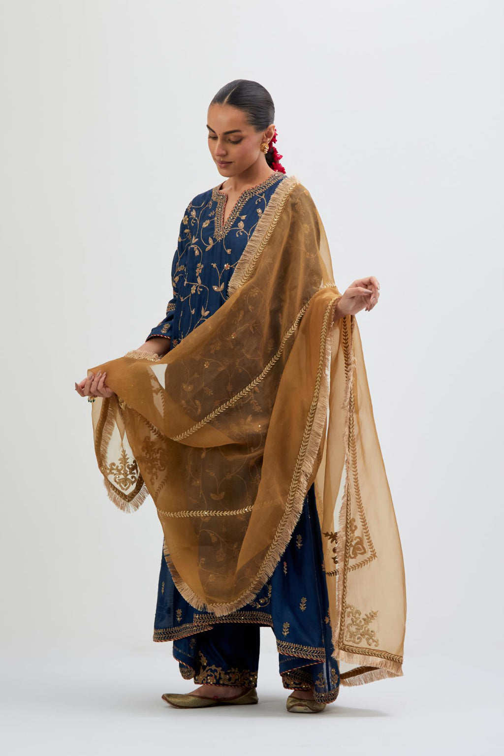 Olive Silk Organza dupatta detailed with all-over dull gold dori embroidery, highlighted with multi colored beads and gold sequins work.