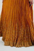 Chanderi 40 kali lehenga edged with dull gold gota embroidery and contrast chanderi facings.