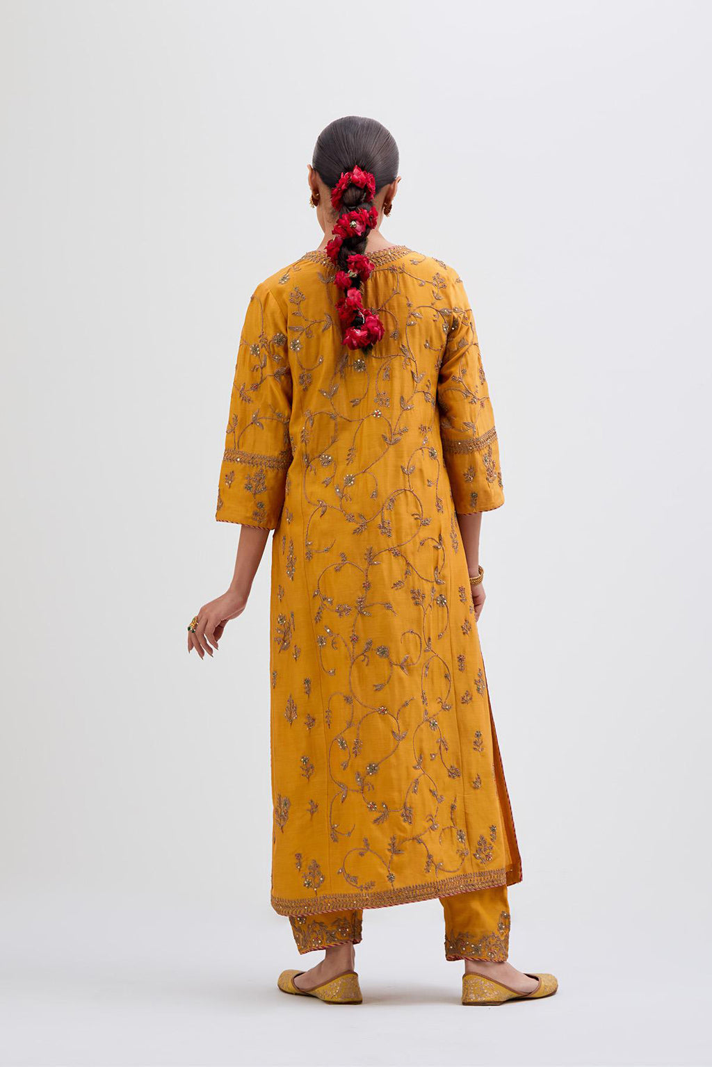 Deep Yellow Silk Chanderi kurta set with all-over dull gold dori jaal embroidery and small floral booti at side panels.