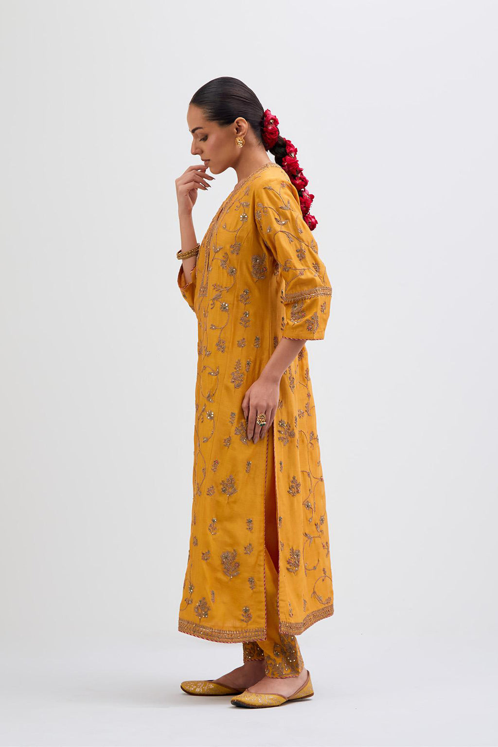 Deep Yellow Silk Chanderi kurta set with all-over dull gold dori jaal embroidery and small floral booti at side panels.