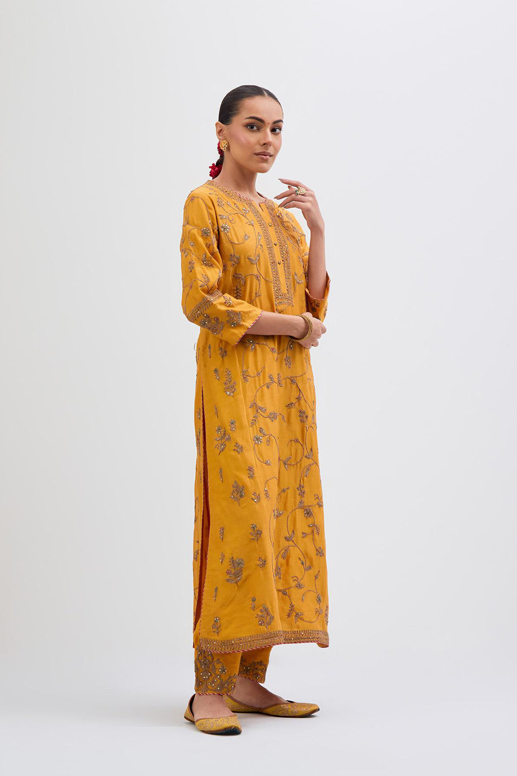 Deep Yellow Silk Chanderi kurta set with all-over dull gold dori jaal embroidery and small floral booti at side panels.