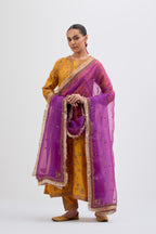 Deep Yellow Silk Chanderi kurta set with all-over dull gold dori jaal embroidery and small floral booti at side panels.