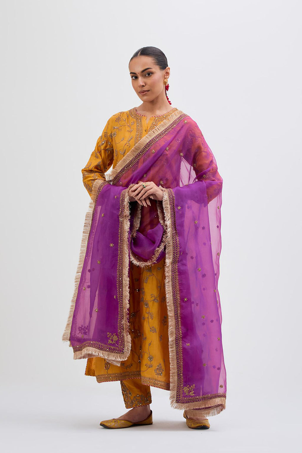 Deep Yellow Silk Chanderi kurta set with all-over dull gold dori jaal embroidery and small floral booti at side panels.
