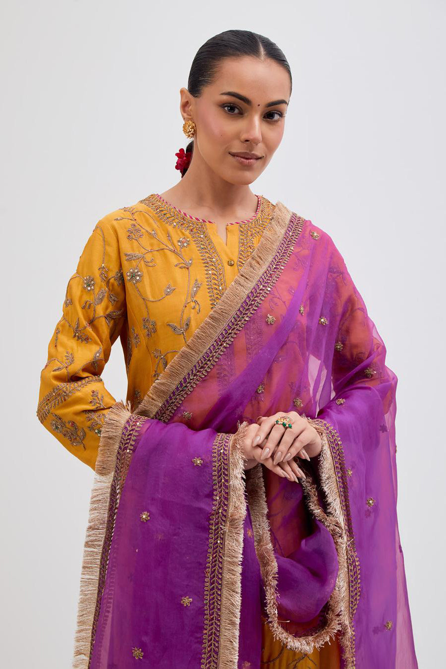 Deep Yellow Silk Chanderi kurta set with all-over dull gold dori jaal embroidery and small floral booti at side panels.