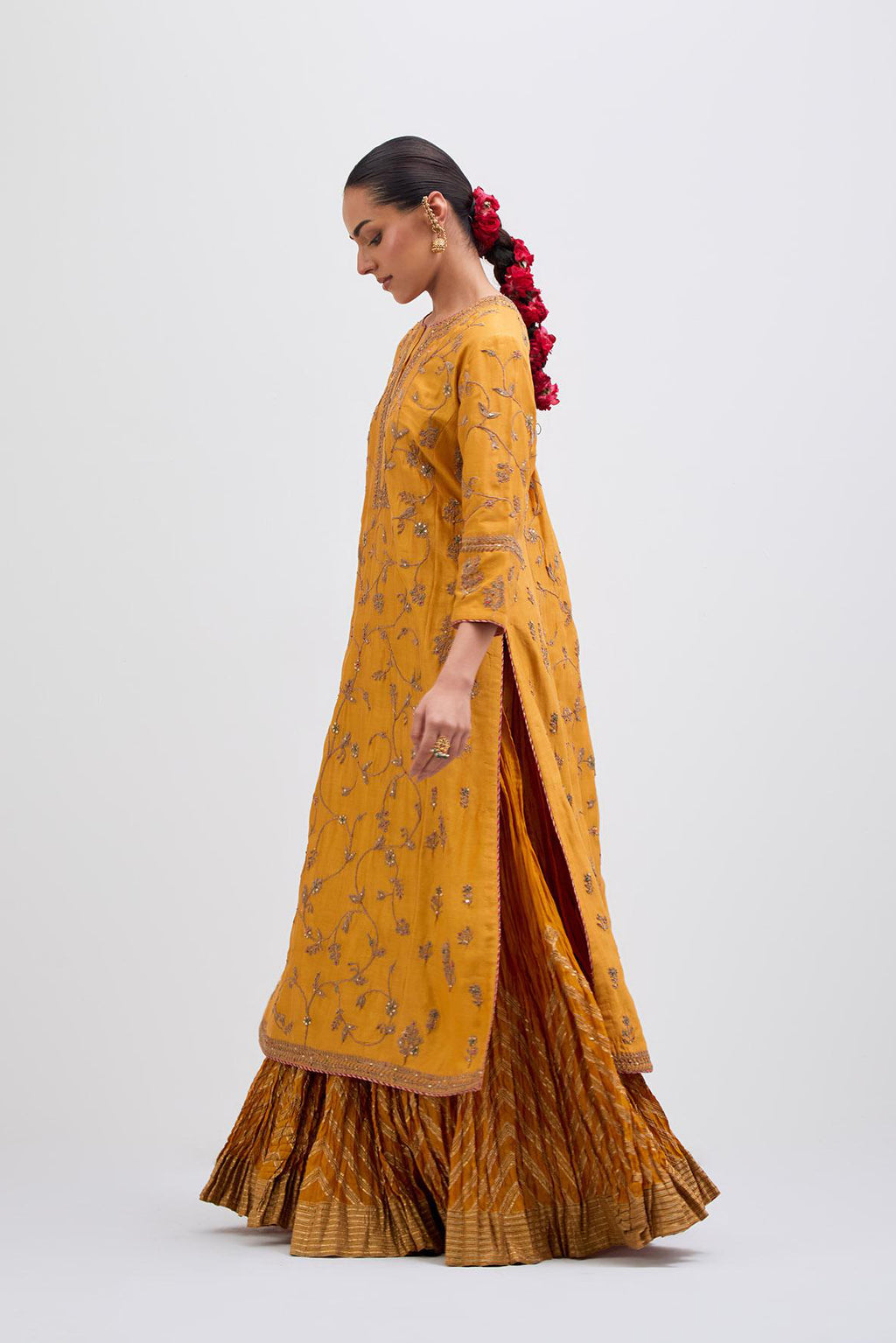 Deep Yellow Silk Chanderi kurta set  with all-over dull gold dori jaal embroidery and small floral booti at side panels.