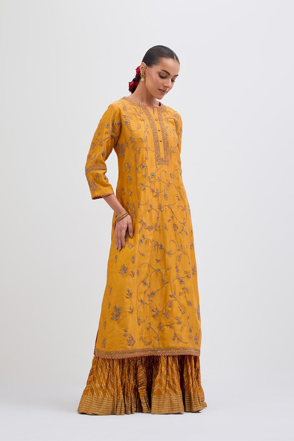 Deep Yellow Silk Chanderi kurta set  with all-over dull gold dori jaal embroidery and small floral booti at side panels.