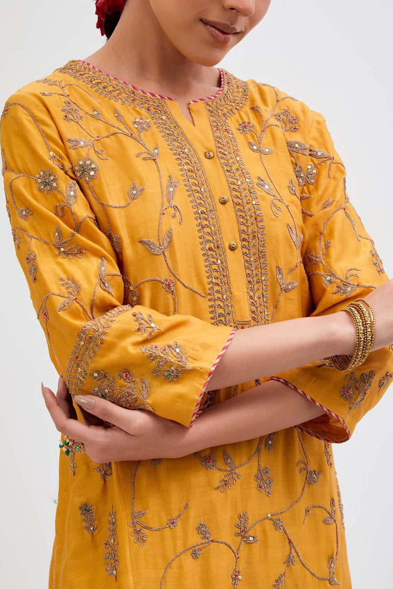 Deep Yellow Silk Chanderi kurta set  with all-over dull gold dori jaal embroidery and small floral booti at side panels.