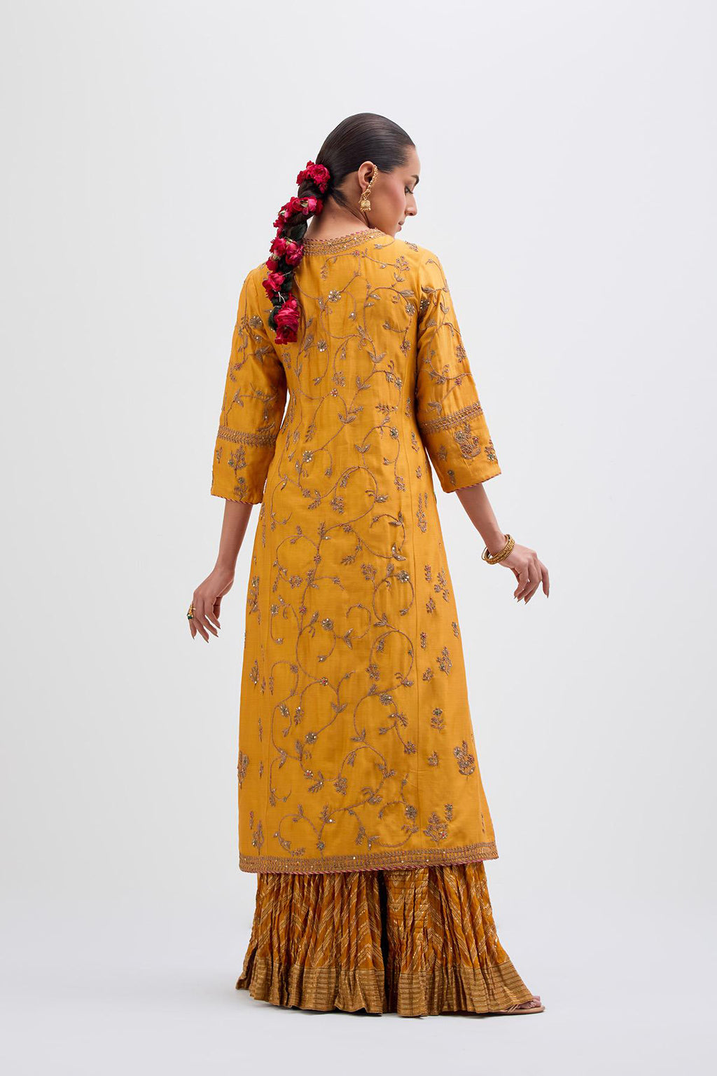 Deep Yellow Silk Chanderi kurta set  with all-over dull gold dori jaal embroidery and small floral booti at side panels.