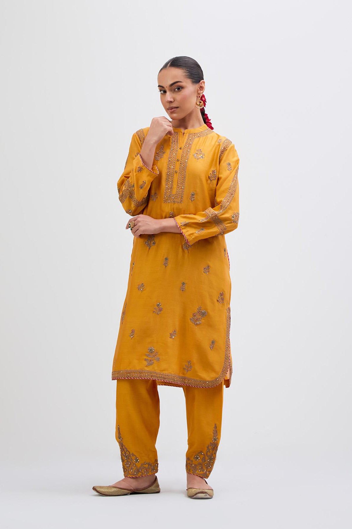 Deep Yellow Silk Chanderi short kurta set with dull gold dori embroidery, highlighted with gold sequins and bead work.