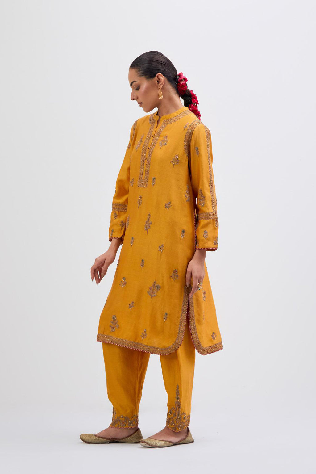 Deep Yellow Silk Chanderi short kurta set with dull gold dori embroidery, highlighted with gold sequins and bead work.