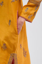 Deep Yellow Silk Chanderi short kurta set with dull gold dori embroidery, highlighted with gold sequins and bead work.