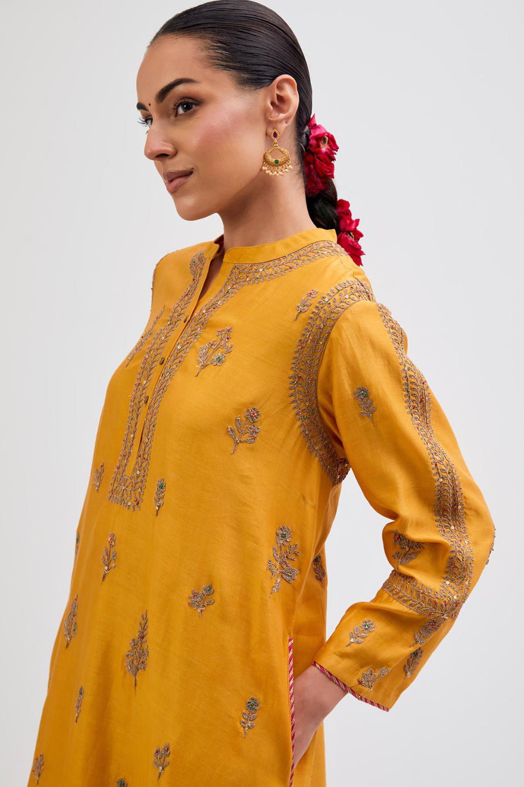 Deep Yellow Silk Chanderi short kurta set with dull gold dori embroidery, highlighted with gold sequins and bead work.