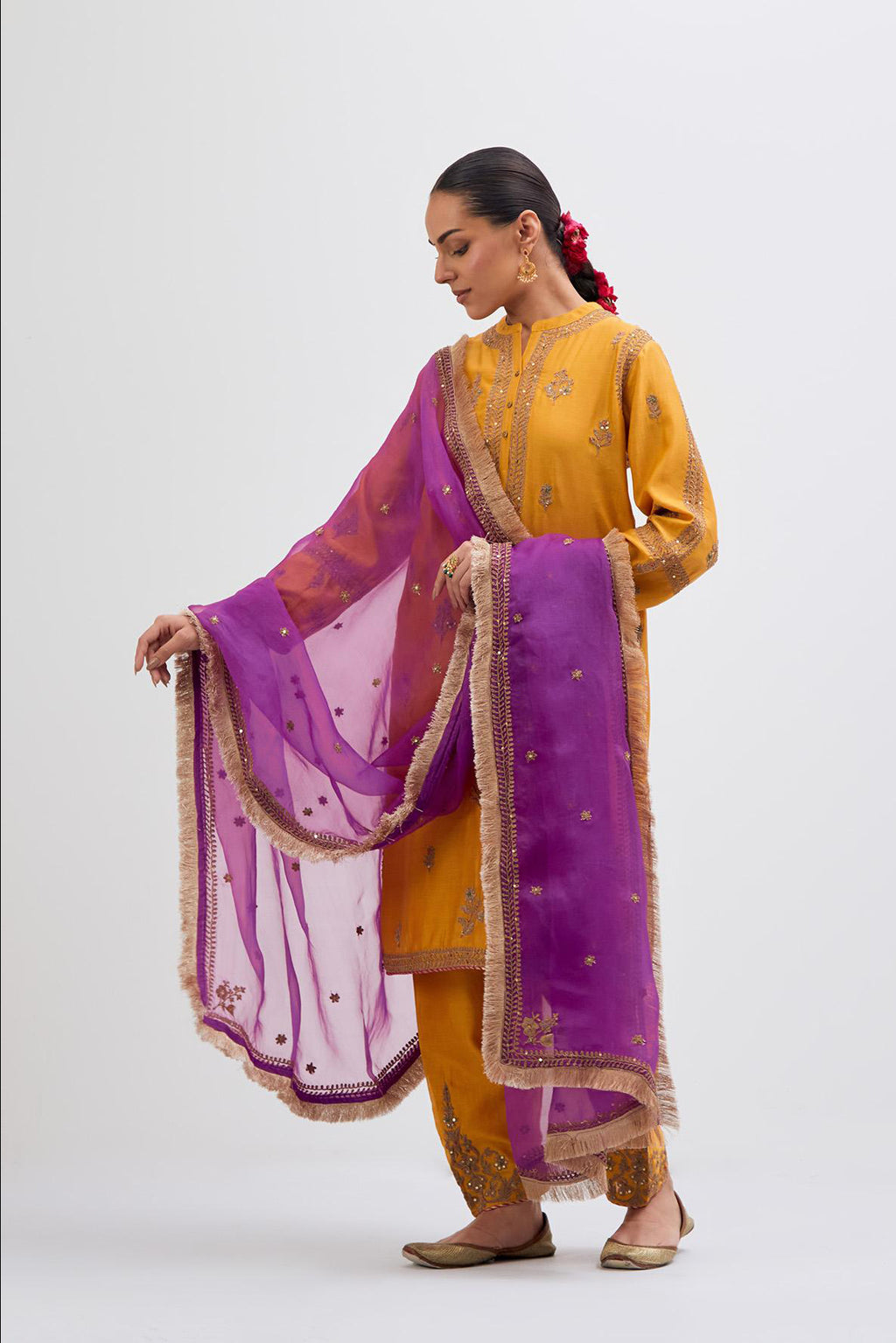 Deep Yellow Silk Chanderi short kurta set with dull gold dori embroidery, highlighted with gold sequins and bead work.