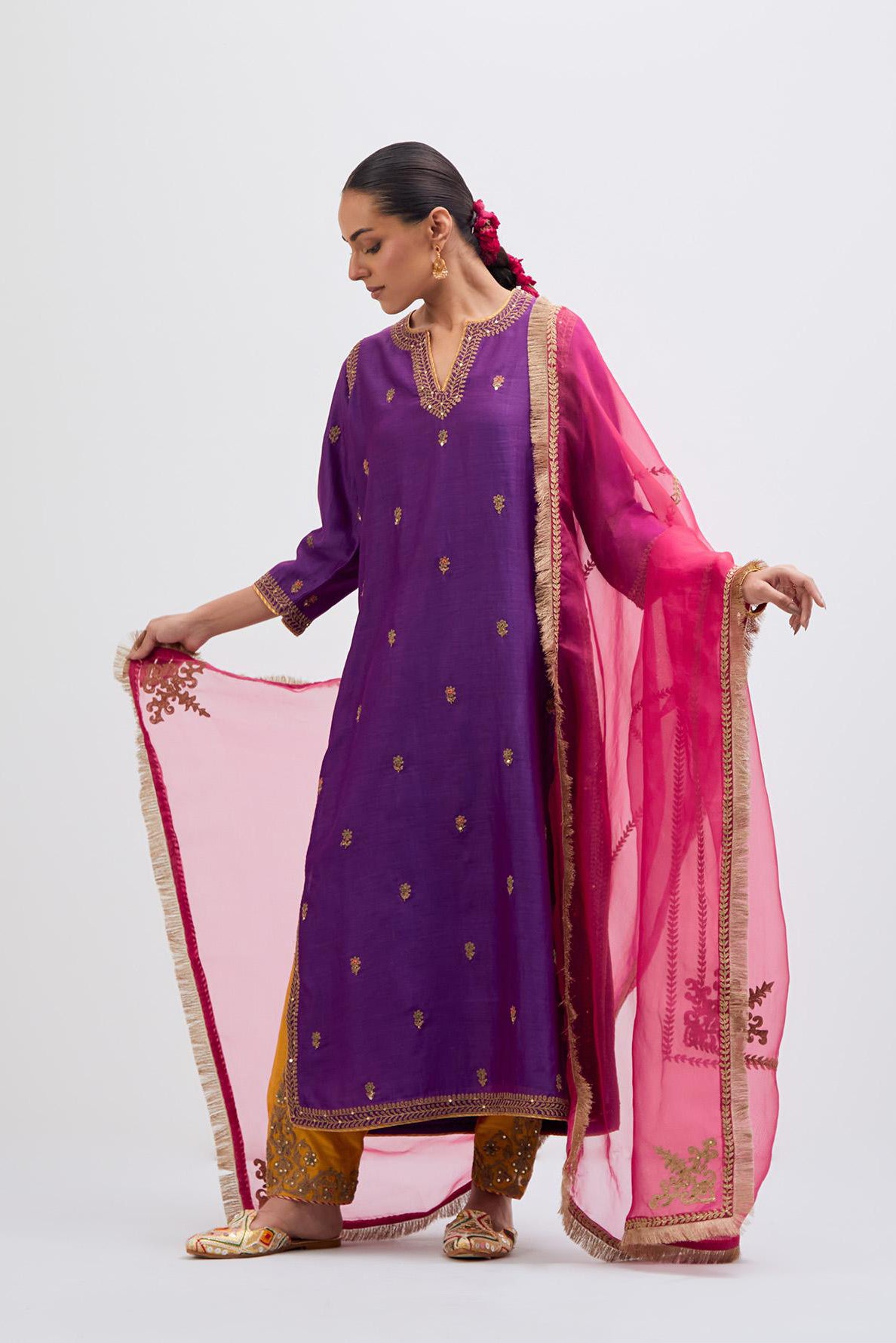 Purple Silk Chanderi straight kurta set with narrow border dull gold dori embroidery at front & back neck, sleeves, side slits and hem, highlighted with gold sequins and bead work.