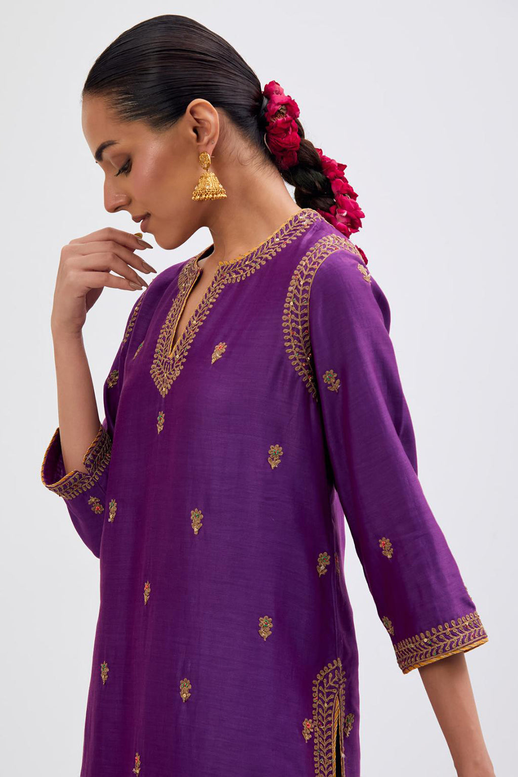 Fuchsia Silk Chanderi straight kurta set with narrow border dull gold dori embroidery at front & back neck, sleeves, side slits and hem, highlighted with gold sequins and bead work.