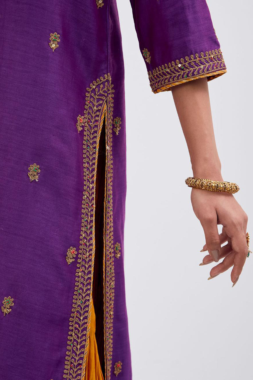 Fuchsia Silk Chanderi straight kurta set with narrow border dull gold dori embroidery at front & back neck, sleeves, side slits and hem, highlighted with gold sequins and bead work.