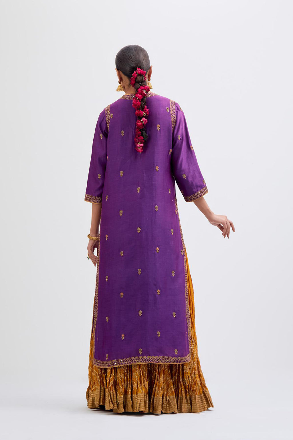 Fuchsia Silk Chanderi straight kurta set with narrow border dull gold dori embroidery at front & back neck, sleeves, side slits and hem, highlighted with gold sequins and bead work.