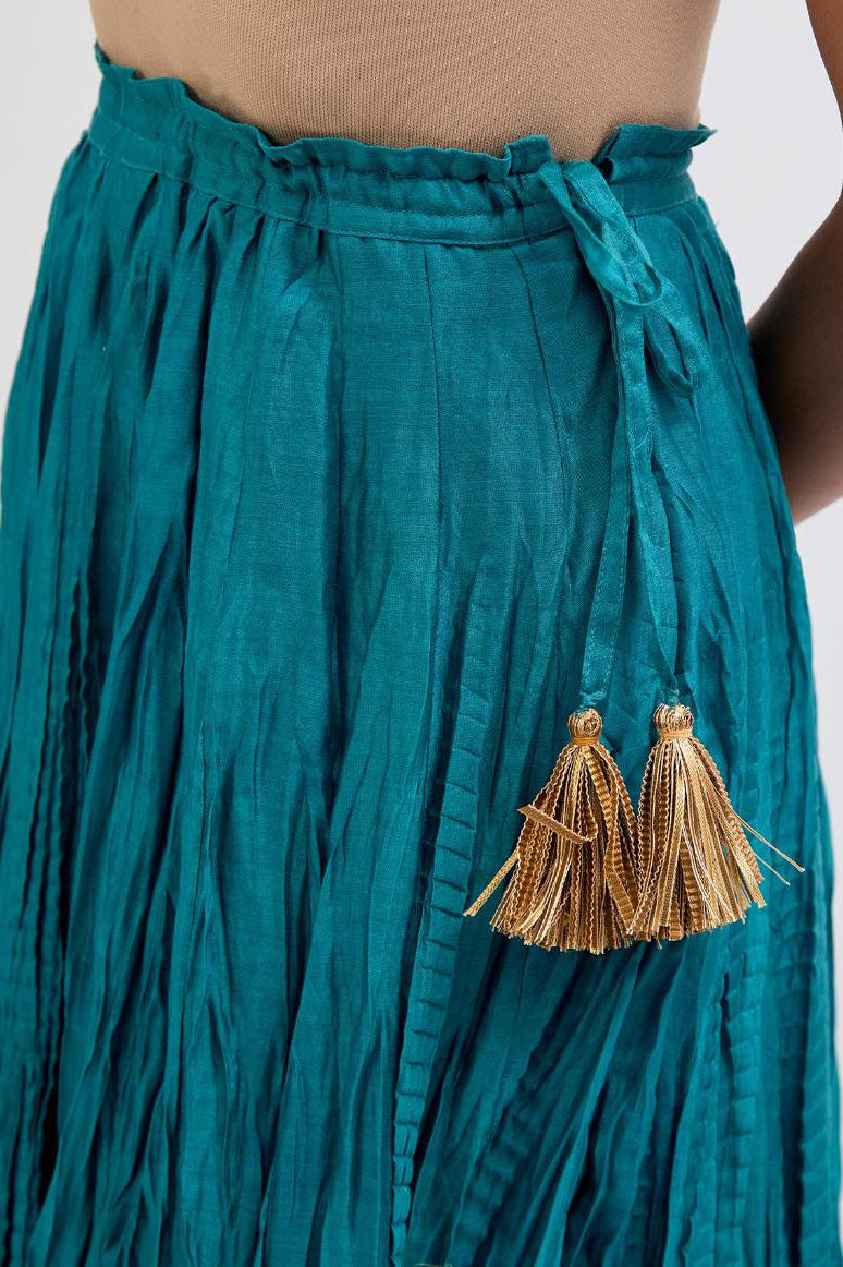 Chanderi 40 kali lehenga edged with dull gold gota embroidery and contrast chanderi facings.