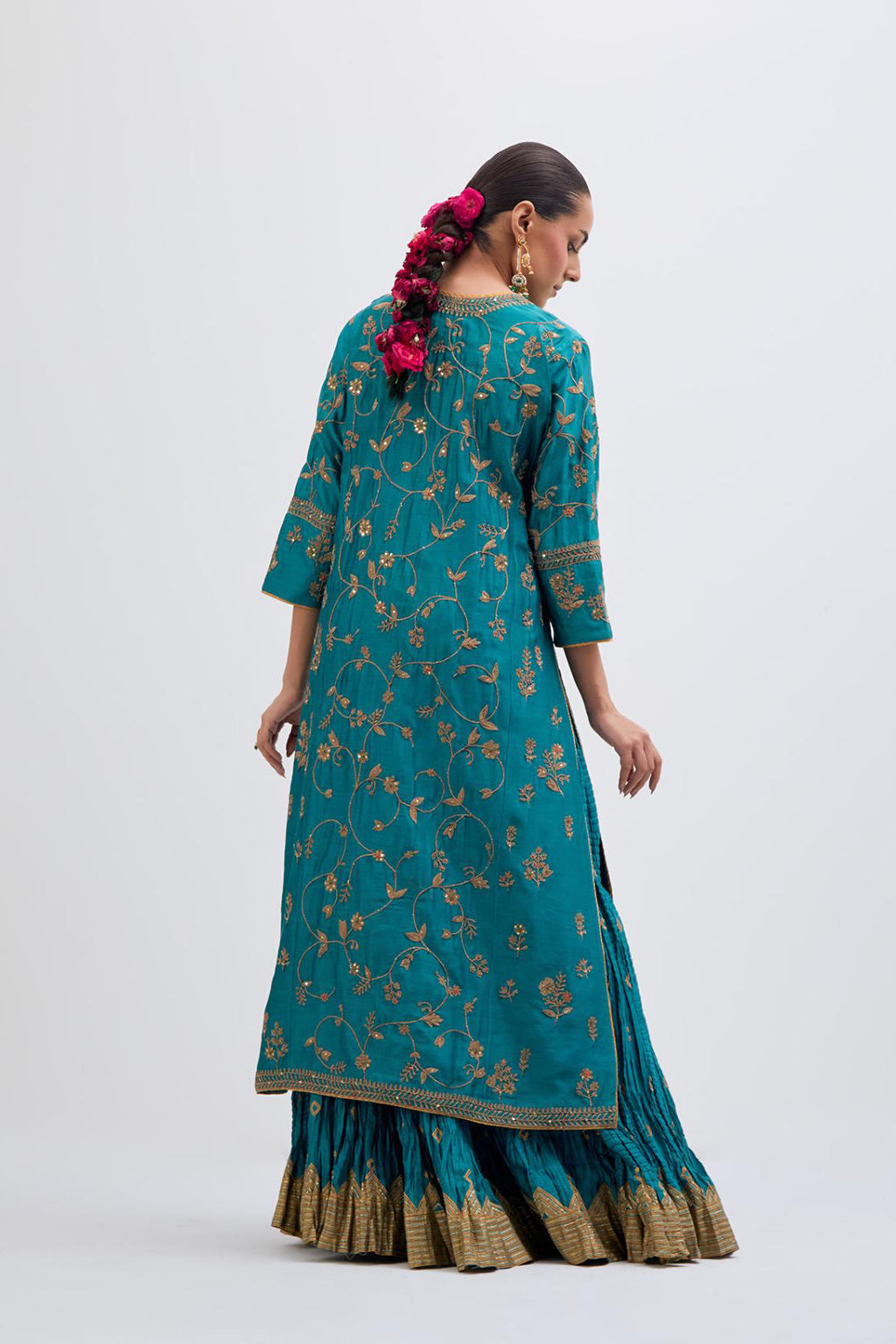 Teal Silk Chanderi kurta set with all-over dull gold dori jaal embroidery and small floral booti at side panels.