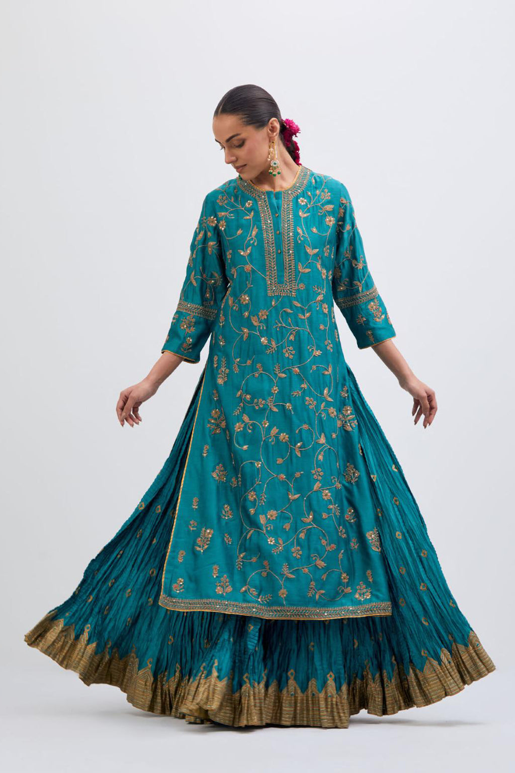 Teal Silk Chanderi kurta set with all-over dull gold dori jaal embroidery and small floral booti at side panels.