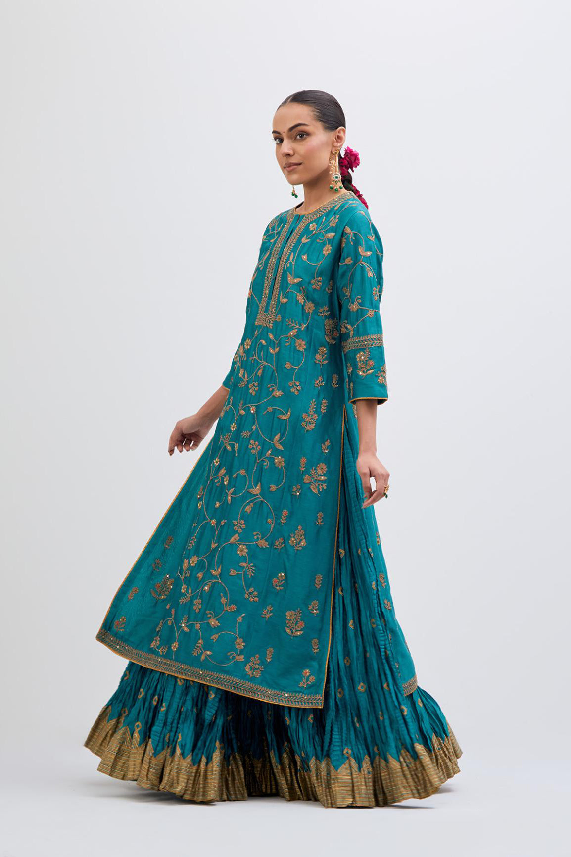 Teal Silk Chanderi kurta set with all-over dull gold dori jaal embroidery and small floral booti at side panels.