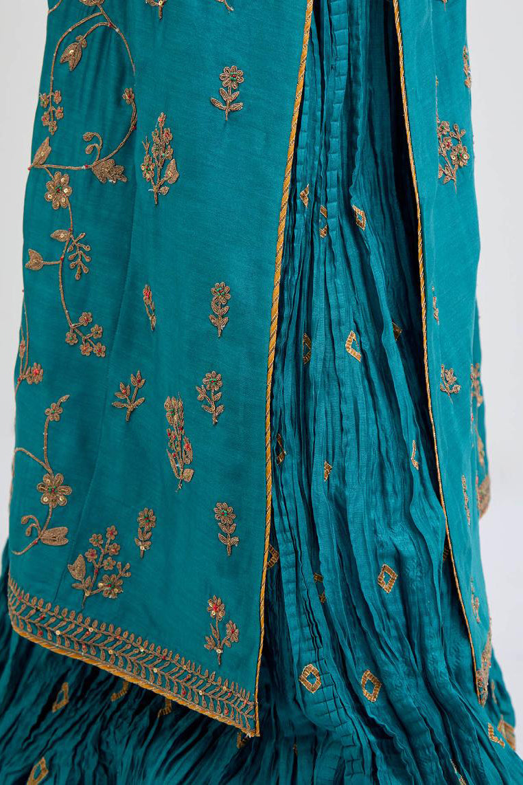 Teal Silk Chanderi kurta set with all-over dull gold dori jaal embroidery and small floral booti at side panels.