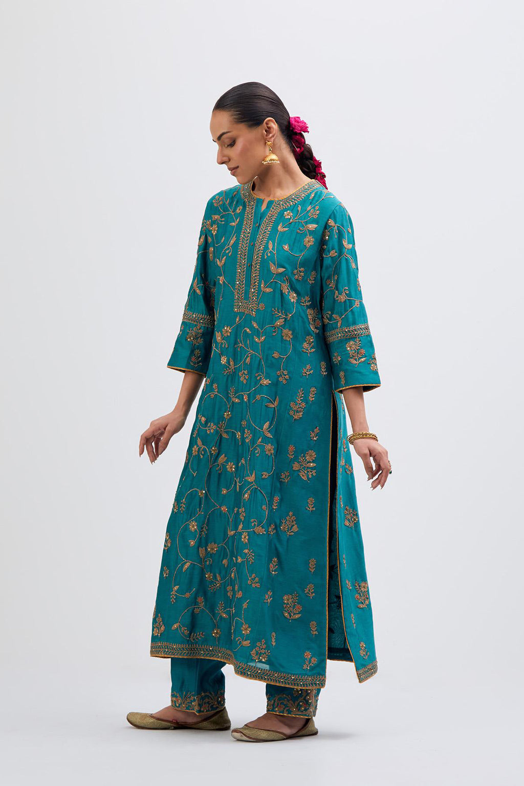 Teal Silk Chanderi kurta set with all-over dull gold dori jaal embroidery and small floral booti at side panels.