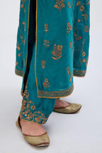 Teal Silk Chanderi kurta set with all-over dull gold dori jaal embroidery and small floral booti at side panels.
