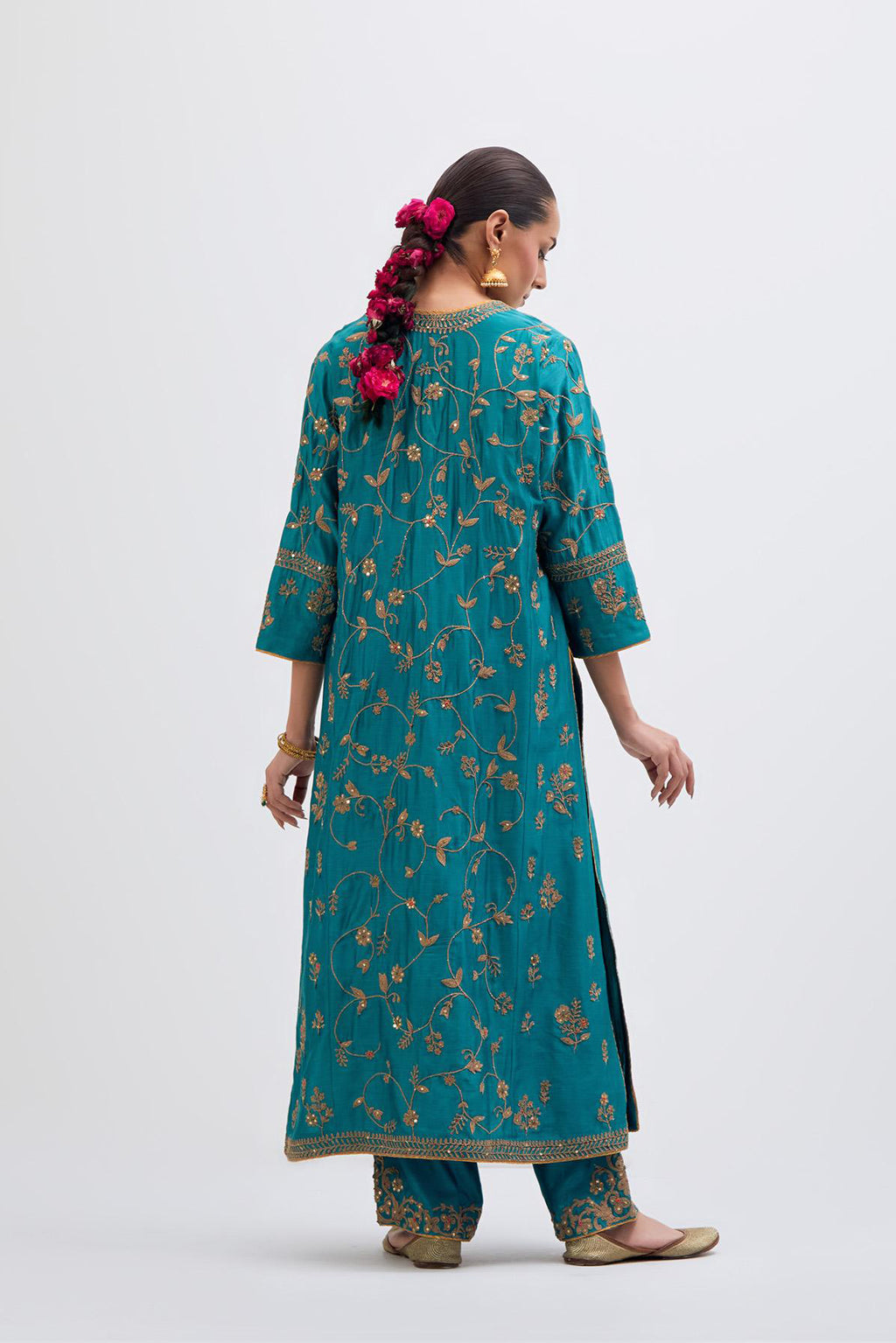 Teal Silk Chanderi kurta set with all-over dull gold dori jaal embroidery and small floral booti at side panels.