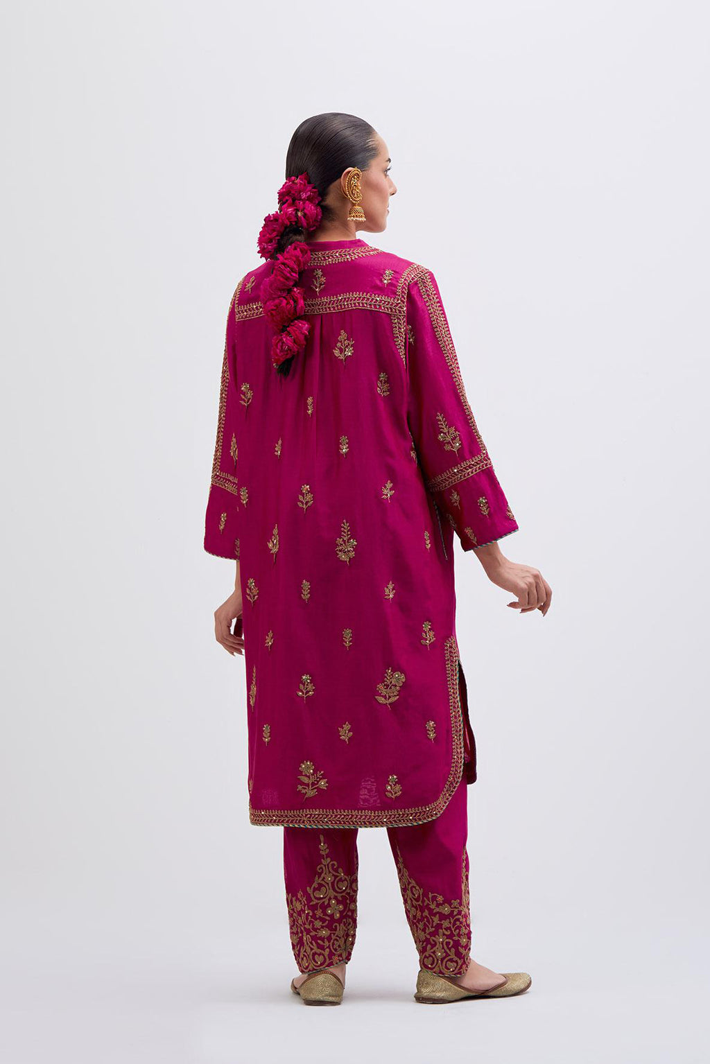 Fuchsia Silk Chanderi short kurta set with dull gold dori embroidery, highlighted with gold sequins and bead work.