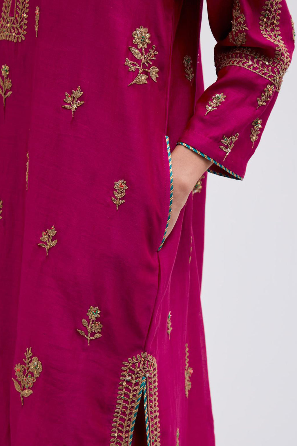 Fuchsia Silk Chanderi short kurta set with dull gold dori embroidery, highlighted with gold sequins and bead work.