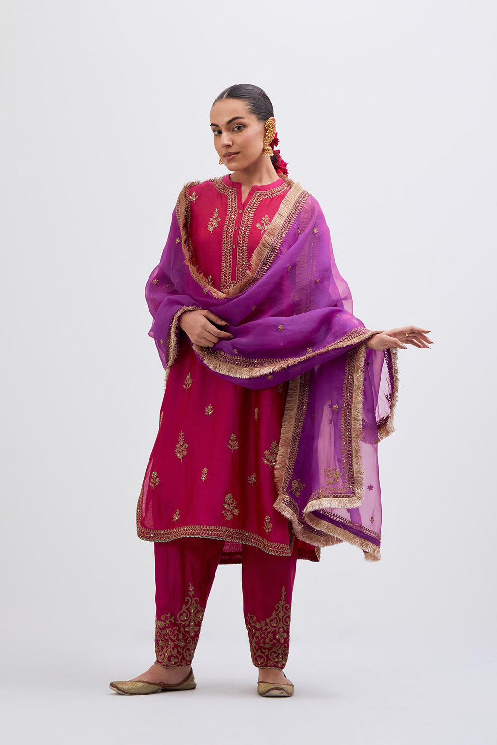 Fuchsia Silk Chanderi short kurta set with dull gold dori embroidery, highlighted with gold sequins and bead work.