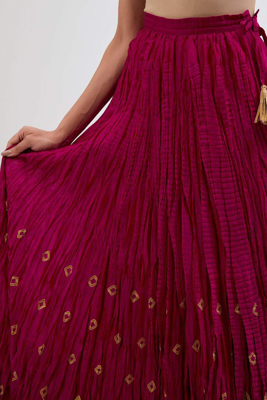 Chanderi 40 kali lehenga edged with dull gold gota embroidery and contrast chanderi facings.