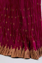 Chanderi 40 kali lehenga edged with dull gold gota embroidery and contrast chanderi facings.