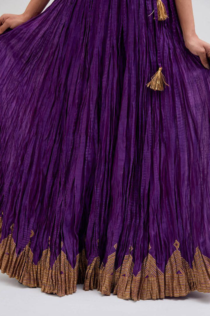 Chanderi 40 kali lehenga edged with dull gold gota embroidery and contrast chanderi facings.