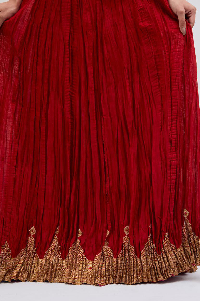 Chanderi 40 kali lehenga edged with dull gold gota embroidery and contrast chanderi facings.