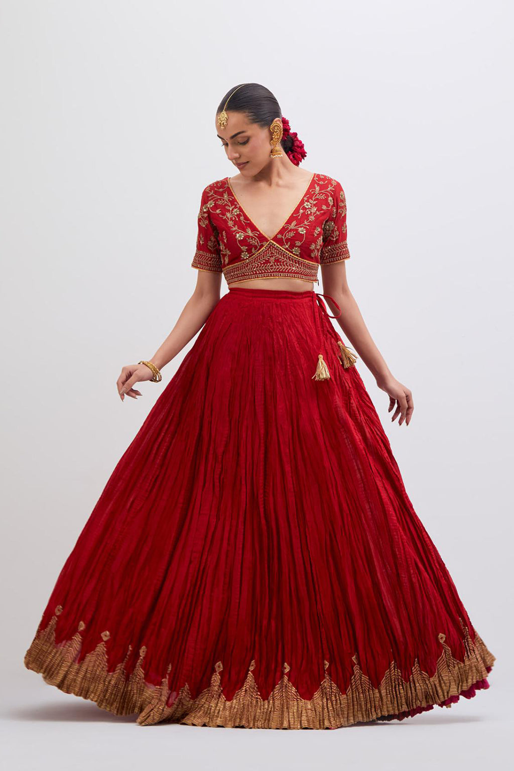 Bright Red Silk Chanderi choli set with all-over dull gold dori embroidery, highlighted with multi colored beads and gold sequins work.