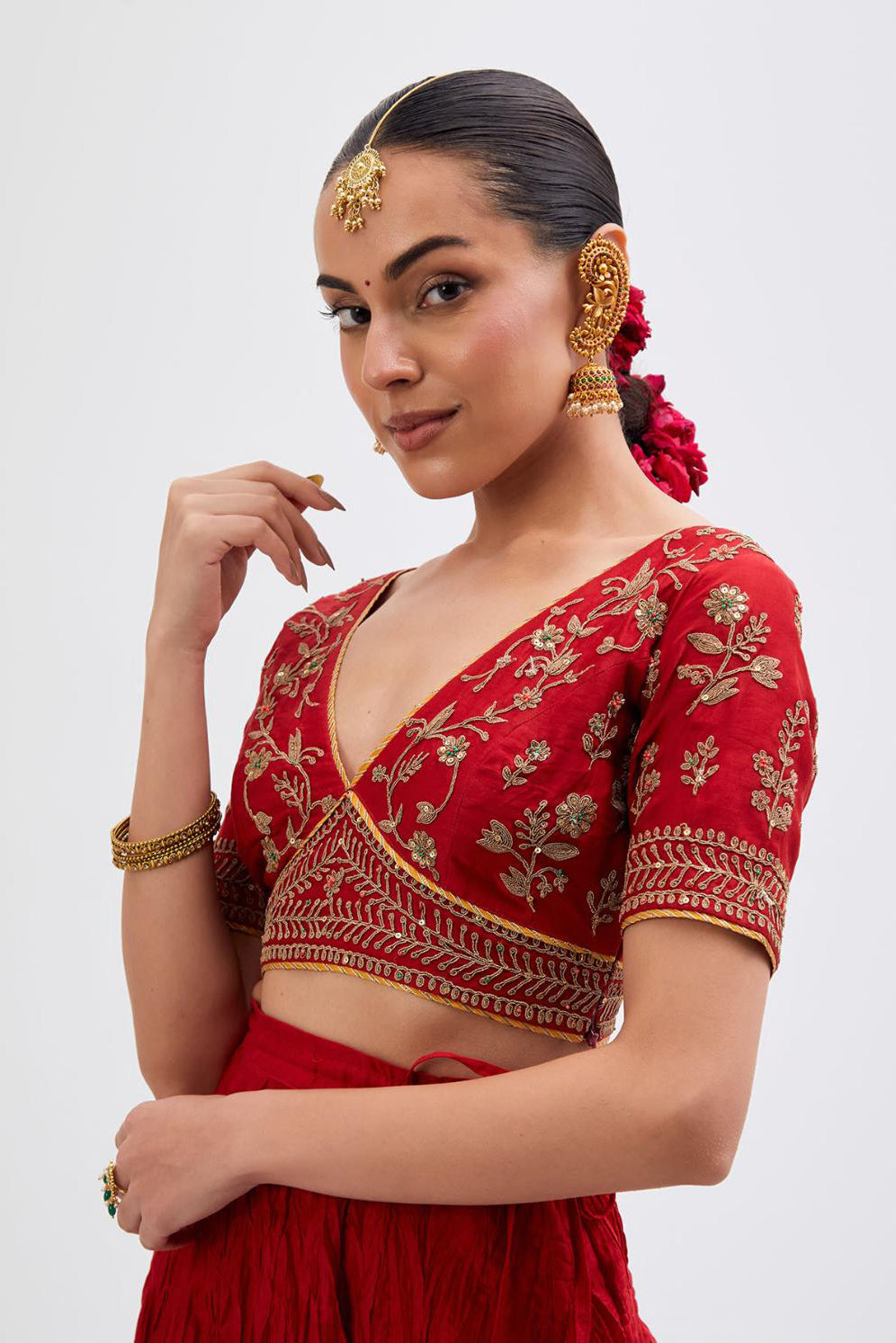 Bright Red Silk Chanderi choli set with all-over dull gold dori embroidery, highlighted with multi colored beads and gold sequins work.