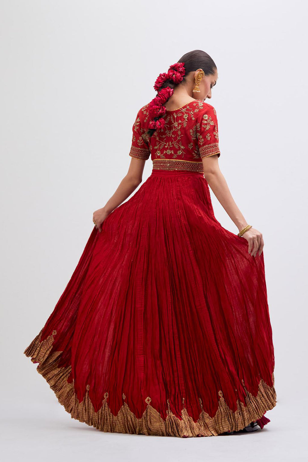 Bright Red Silk Chanderi choli set with all-over dull gold dori embroidery, highlighted with multi colored beads and gold sequins work.