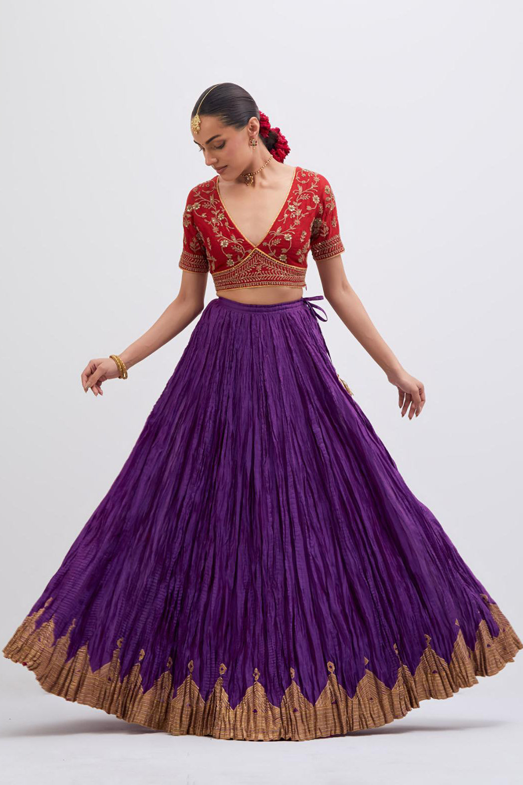 Bright Red Silk Chanderi choli set with all-over dull gold dori embroidery, highlighted with multi colored beads and gold sequins work.