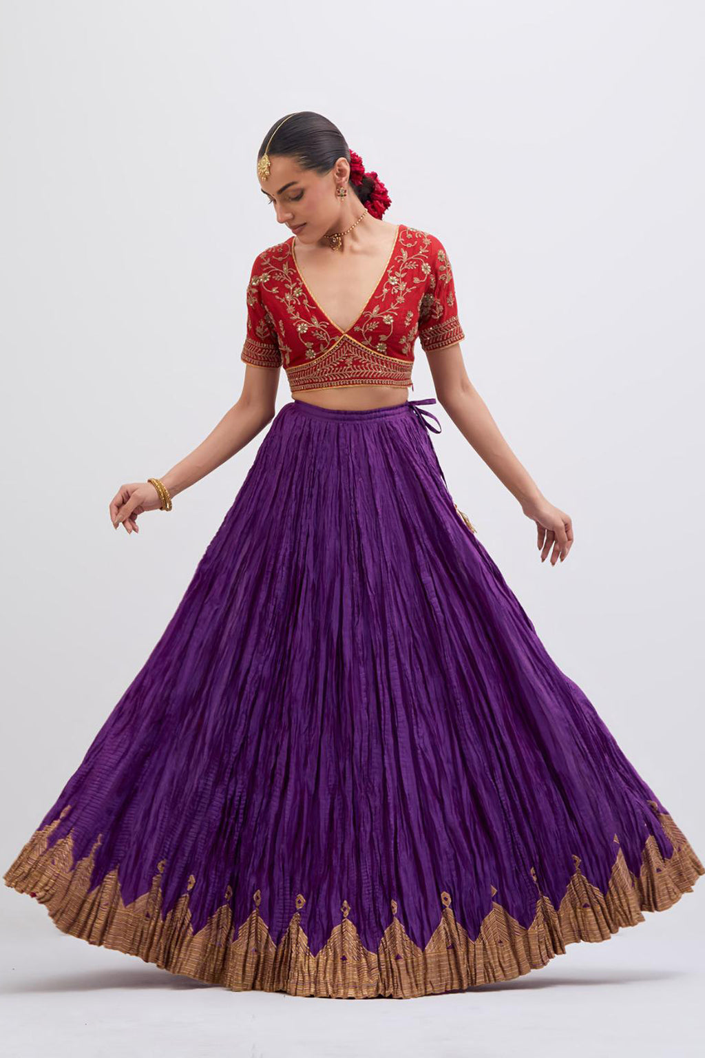 Bright Red Silk Chanderi choli set with all-over dull gold dori embroidery, highlighted with multi colored beads and gold sequins work.