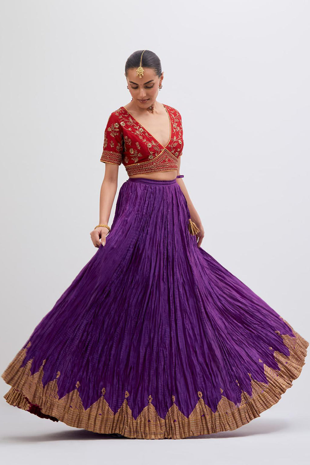 Bright Red Silk Chanderi choli set with all-over dull gold dori embroidery, highlighted with multi colored beads and gold sequins work.