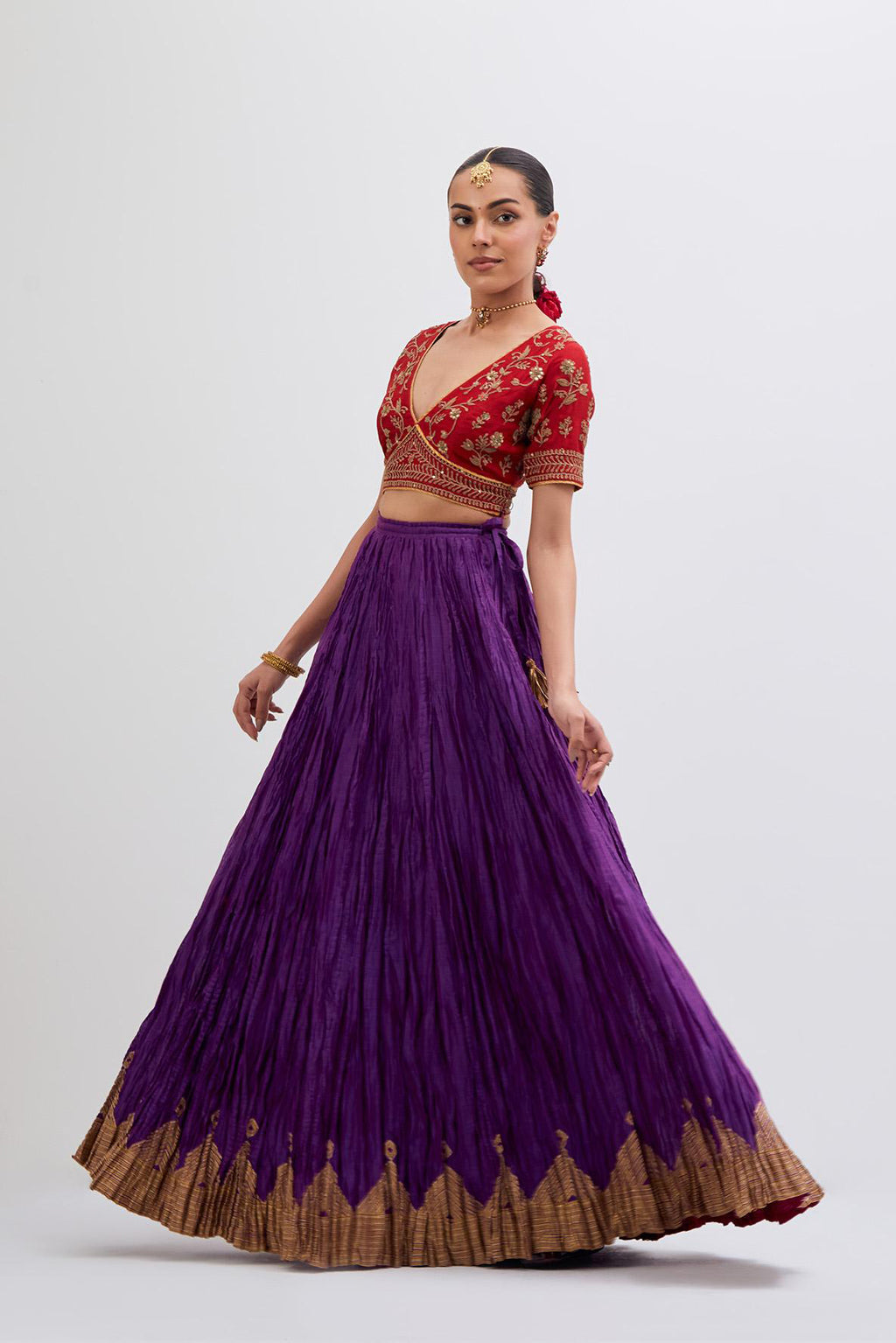 Bright Red Silk Chanderi choli set with all-over dull gold dori embroidery, highlighted with multi colored beads and gold sequins work.