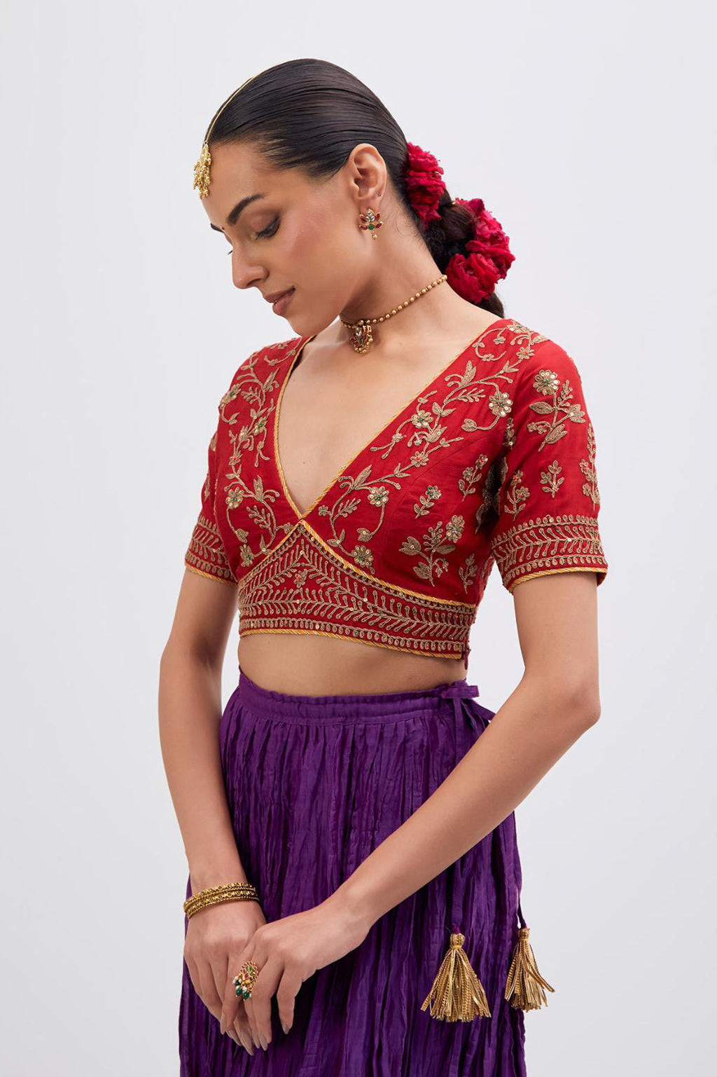 Bright Red Silk Chanderi choli set with all-over dull gold dori embroidery, highlighted with multi colored beads and gold sequins work.
