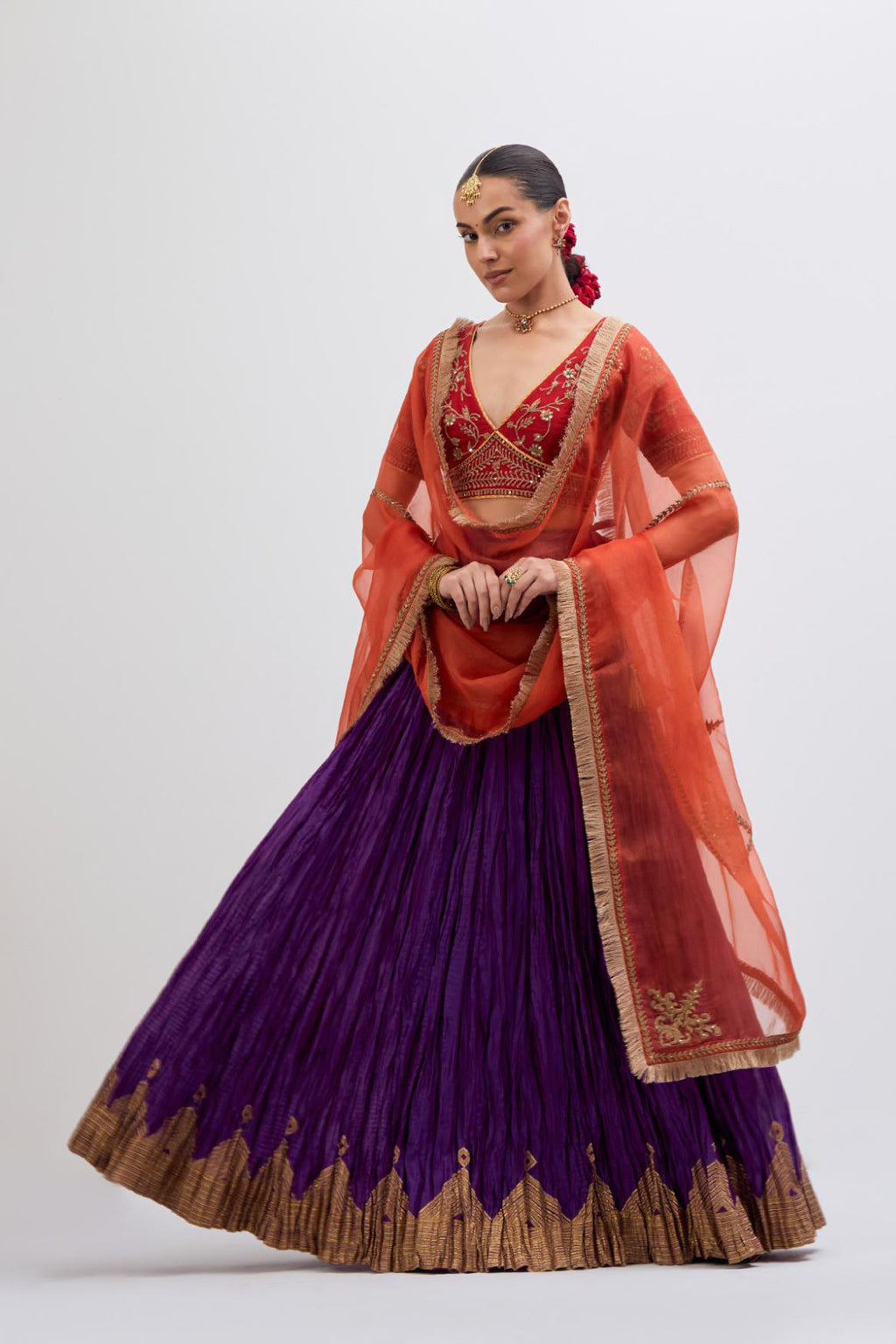 Bright Red Silk Chanderi choli set with all-over dull gold dori embroidery, highlighted with multi colored beads and gold sequins work.