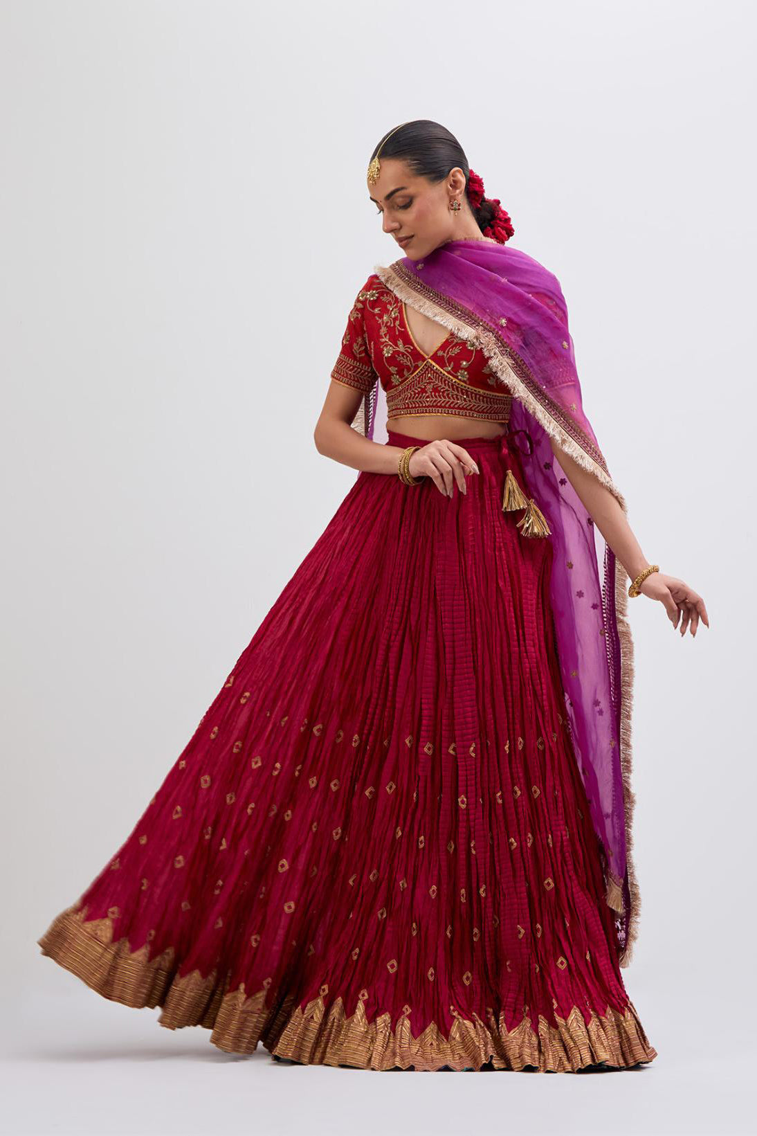 Bright Red Silk Chanderi choli set with all-over dull gold dori embroidery, highlighted with multi colored beads and gold sequins work.