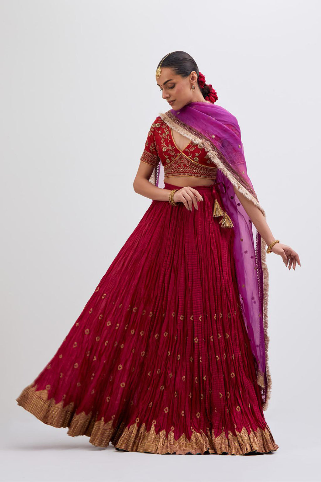 Bright Red Silk Chanderi choli set with all-over dull gold dori embroidery, highlighted with multi colored beads and gold sequins work.