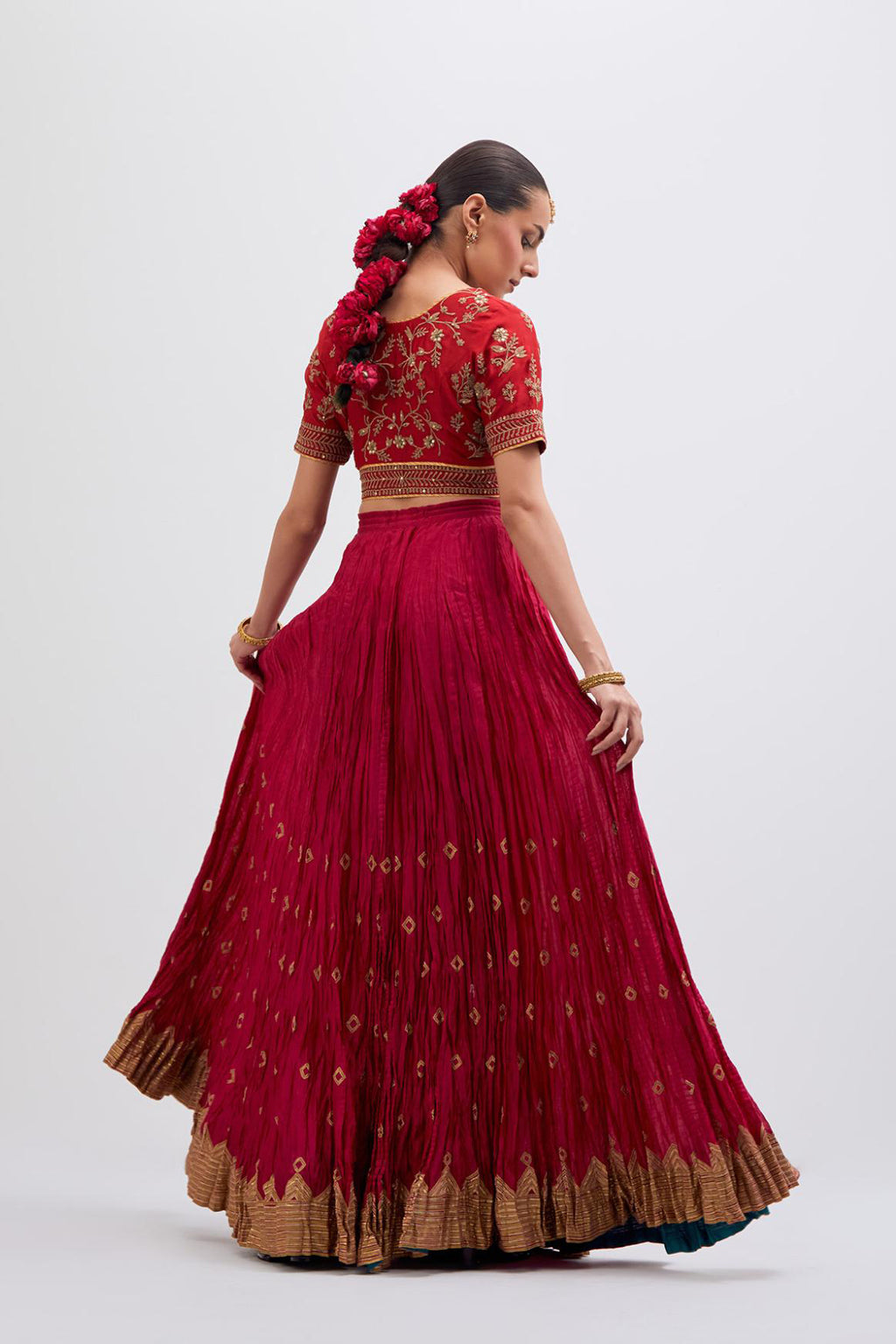 Bright Red Silk Chanderi choli set with all-over dull gold dori embroidery, highlighted with multi colored beads and gold sequins work.