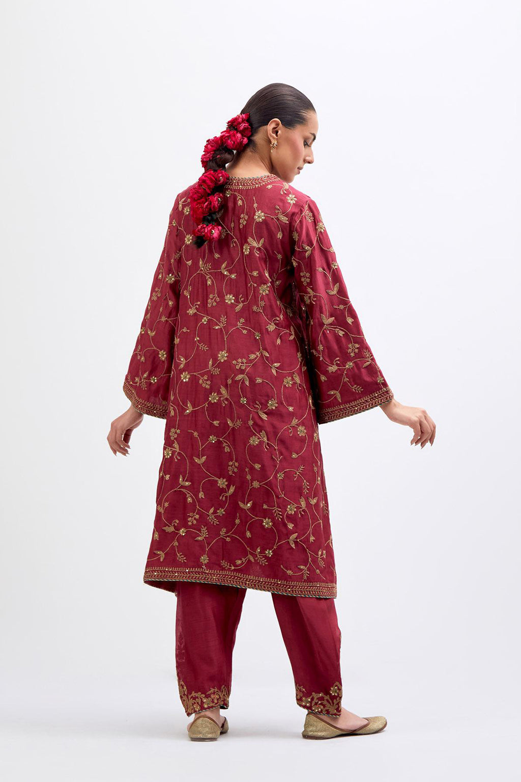 Red Silk Chanderi A-line short kurta set with all-over dull gold dori embroidery, highlighted with multi colored bead and gold sequins work.